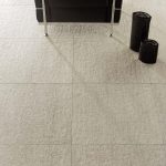 Absolute interior porcelain tile in the finish Beola Bianca used in a livingroom