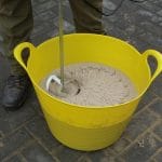 ProJoint™ V75-WT™ Epoxy Resin System being mixed in a yellow bucket