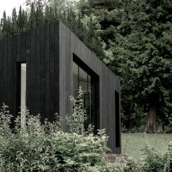 Koto Cabin with Charred Timber Cladding in woodland