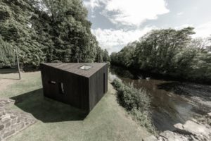 Koto Cabin with Shou Sugi Ban® Charred Timber Cladding next to river